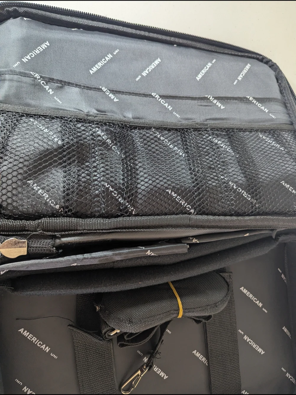 New with tags American Uni travel laptop and document organizer bag in black.